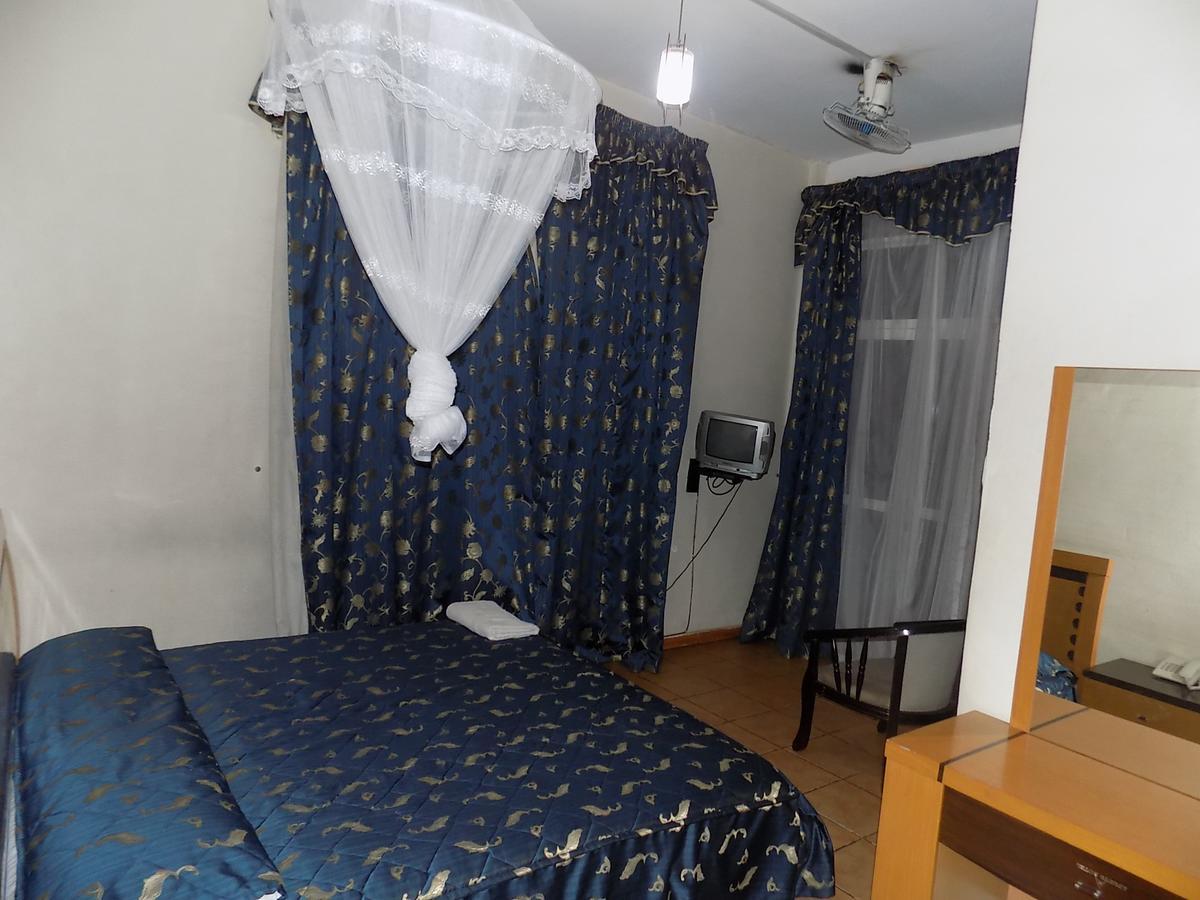 Aponye Hotel Кампала Экстерьер фото