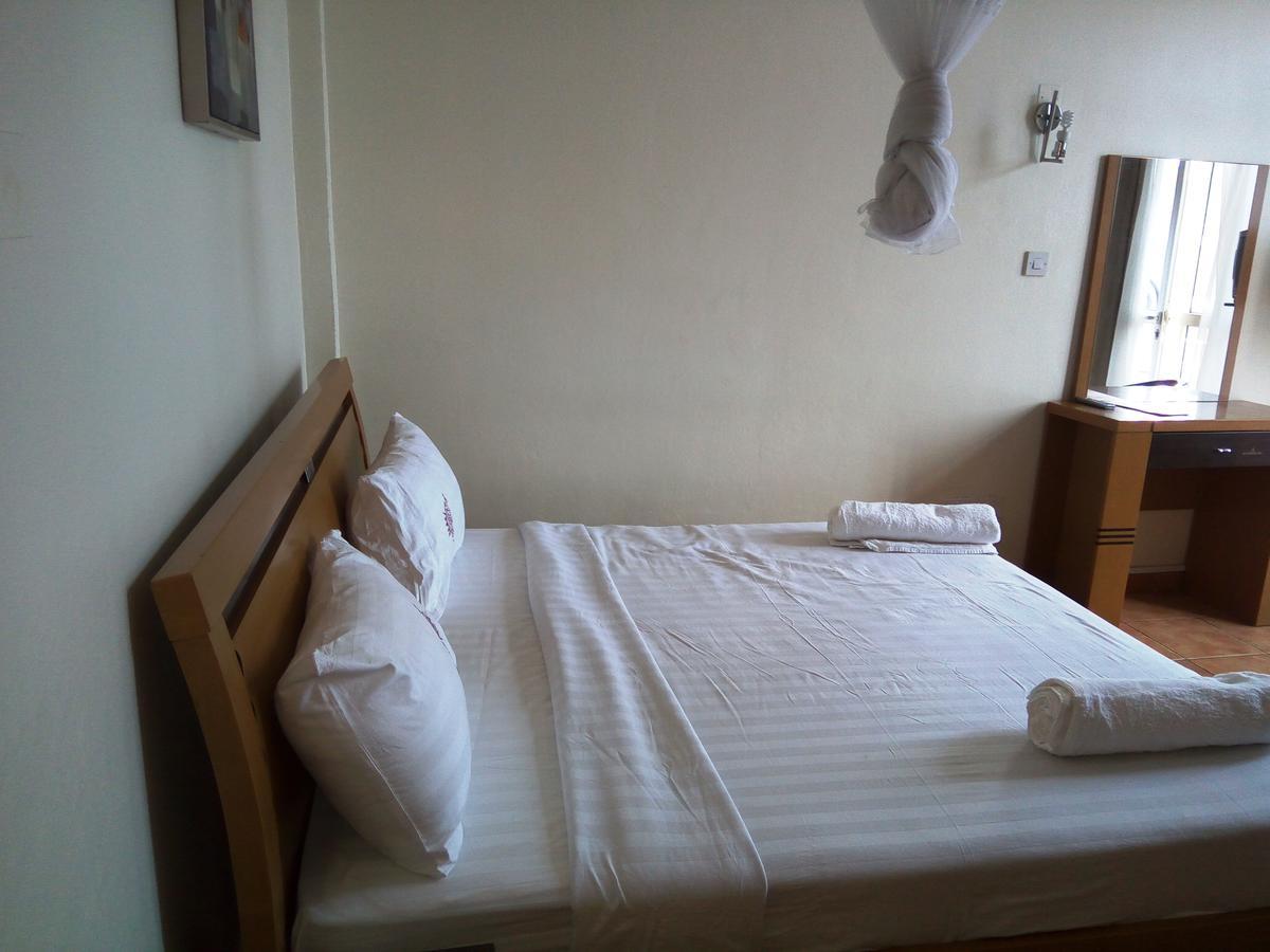Aponye Hotel Кампала Экстерьер фото
